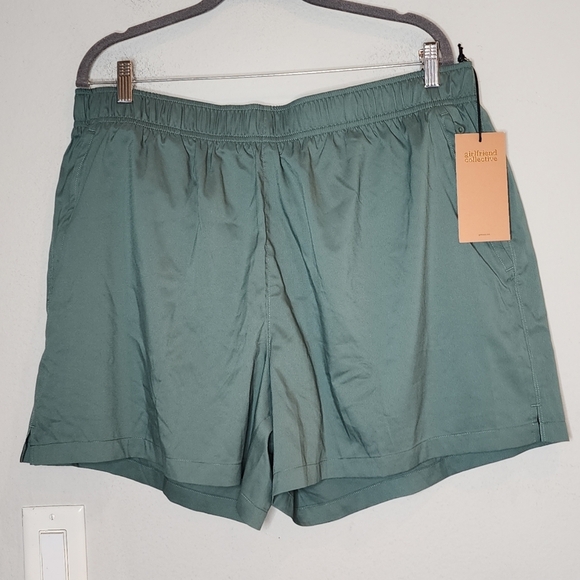 girlfriend collective Pants - NWT Girlfriend Collective Green Lined Running shorts. Size 7. Estimated 2X/3X